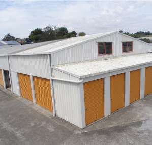 Warehouse-style storage building with large roller doors